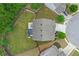 Aerial view of a home showcasing a spacious backyard, patio area, and manicured landscaping at 4238 Linworth Blvd, Austell, GA 30106