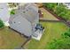 Exterior view featuring a well-maintained backyard with a deck and lush green grass at 4238 Linworth Blvd, Austell, GA 30106