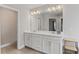 Bright bathroom features double vanity and open sight lines to bathtub and shower at 4238 Linworth Blvd, Austell, GA 30106