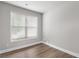 Bright bedroom featuring hardwood floors and a large window for ample natural light at 4238 Linworth Blvd, Austell, GA 30106