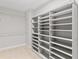 This walk-in closet has ample shelving and hanging space at 4238 Linworth Blvd, Austell, GA 30106