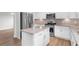Bright kitchen features stainless appliances, granite countertops, and a central island at 4238 Linworth Blvd, Austell, GA 30106