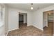 Dining area with tile flooring, neutral walls, and easy access to other rooms at 565 Lake Joyce Ln, Fairburn, GA 30213