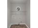 Small laundry room with tile floor, and a utility sink hook up for a washing machine at 565 Lake Joyce Ln, Fairburn, GA 30213