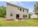 Spacious backyard featuring a well-maintained lawn, outdoor seating, and a clear view of the home at 10204 Deep Creek Pl, Union City, GA 30291