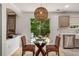 Dining Area with stylish lighting fixture, seating, and view to backyard at 10204 Deep Creek Pl, Union City, GA 30291