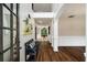 Inviting foyer with hardwood floors, bench seating, and natural light at 10204 Deep Creek Pl, Union City, GA 30291