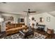 Spacious living room with hardwood floors, comfortable seating, and an open layout leading to the kitchen at 10204 Deep Creek Pl, Union City, GA 30291