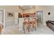 Inviting kitchen featuring a breakfast bar with seating and stainless steel appliances at 609 Grand Ashbury Ln, Buford, GA 30518
