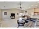 Comfortable living room with vaulted ceilings, wood floors, and open concept design at 609 Grand Ashbury Ln, Buford, GA 30518