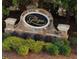 Stone community sign for The Georgian, surrounded by manicured landscaping at 93 Richmond Way, Villa Rica, GA 30180