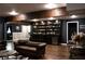 Finished basement featuring a large custom bar, sofa and ample storage for an entertainer's delight at 154 Carmen Ln, Dallas, GA 30157