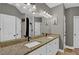 Bathroom with double vanity, granite countertop, tile floor, and walk-in shower at 154 Carmen Ln, Dallas, GA 30157