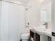 Bathroom featuring a shower with a white curtain, toilet, and modern vanity at 1606 Rock Dam Dr # 11, Atlanta, GA 30317