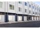 Modern townhome exteriors with garage parking, showcasing sleek design at 1606 Rock Dam Dr # 11, Atlanta, GA 30317