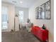 A minimalist home office with natural light, white walls and polished concrete floors at 1606 Rock Dam Dr # 11, Atlanta, GA 30317