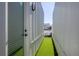 A secluded outdoor patio with artificial grass, offering a private relaxation space at 1606 Rock Dam Dr # 11, Atlanta, GA 30317