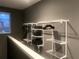 A walk-in closet with metal shelving and hanging rods, providing ample storage space at 1606 Rock Dam Dr # 11, Atlanta, GA 30317