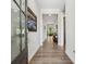 Inviting entryway with hardwood floors, neutral walls, and natural light from the sidelight window at 3210 Steinbeck St, Cumming, GA 30041