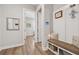 Inviting hallway with decorative bench seating and access to other rooms in the house at 3210 Steinbeck St, Cumming, GA 30041