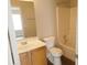 Full bathroom with tub/shower, wood-look floors and modern fixtures at 3216 Panthers Trce, Decatur, GA 30034