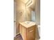 Bright bathroom featuring a single sink vanity with a large mirror and a neutral color scheme at 3216 Panthers Trce, Decatur, GA 30034