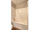 Bathroom with a tub and shower combination featuring an updated shower head and clean white surfaces at 3216 Panthers Trce, Decatur, GA 30034