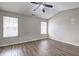 Bedroom with natural light, fan, and wood flooring at 3216 Panthers Trce, Decatur, GA 30034