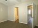 Bedroom with wood-look flooring and ensuite bathroom at 3216 Panthers Trce, Decatur, GA 30034