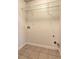 Laundry room with tile flooring and shelf at 3216 Panthers Trce, Decatur, GA 30034