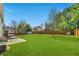 Expansive backyard featuring a well-maintained lawn, perfect for outdoor activities and relaxation at 5015 Scuppernong Ct, Austell, GA 30106