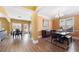 Bright dining room featuring hardwood floors and large windows that offer plenty of natural light at 5015 Scuppernong Ct, Austell, GA 30106