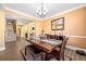Cozy dining area featuring hardwood floors, traditional decor and access to the staircase at 5015 Scuppernong Ct, Austell, GA 30106