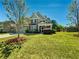 Charming two-story home with well-manicured lawn and lush landscaping at 5015 Scuppernong Ct, Austell, GA 30106