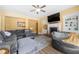 Relaxing living room with a fireplace, entertainment center, and comfortable seating area at 5015 Scuppernong Ct, Austell, GA 30106