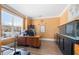 Well-lit home office with a large window, wooden desk, and modern decor at 5015 Scuppernong Ct, Austell, GA 30106