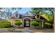 Neighborhood clubhouse with attractive stone and siding accents, offering community amenities at 7491 Hilltop Way, Atlanta, GA 30349