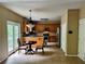 Updated kitchen with stainless steel appliances, countertops, and a breakfast area at 7491 Hilltop Way, Atlanta, GA 30349
