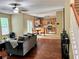 Open living room with a view of the kitchen and staircase at 7491 Hilltop Way, Atlanta, GA 30349