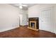 Bedroom featuring hardwood floors and fireplace at 165 Hale Ne St, Atlanta, GA 30307