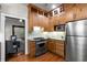 Kitchen with stainless steel appliances, granite countertops, and hardwood floors at 165 Hale Ne St, Atlanta, GA 30307