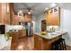 Charming kitchen with stainless steel appliances, granite countertops, and hardwood floors at 165 Hale Ne St, Atlanta, GA 30307