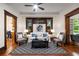 Open living room featuring hardwood floors, a fireplace, and lots of natural light at 165 Hale Ne St, Atlanta, GA 30307