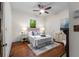 Main bedroom with hardwood floors and a ceiling fan at 165 Hale Ne St, Atlanta, GA 30307