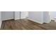 Basement area featuring vinyl wood flooring and white trim at 2223 Columbia Dr, Decatur, GA 30032