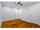 Bedroom featuring hardwood floors, recessed lighting, ceiling fan, and two closets with white doors at 2223 Columbia Dr, Decatur, GA 30032