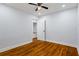 Bedroom with hardwood floors, recessed lighting, a ceiling fan, and a closet with white doors at 2223 Columbia Dr, Decatur, GA 30032