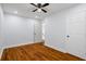 Bedroom with hardwood floors, recessed lighting, a ceiling fan, and a closet with white doors at 2223 Columbia Dr, Decatur, GA 30032