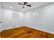 Cozy bedroom features hardwood floors, recessed lighting, and windows providing natural light at 2223 Columbia Dr, Decatur, GA 30032