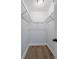 Bright walk-in closet with vinyl flooring and wire rack shelving at 2223 Columbia Dr, Decatur, GA 30032